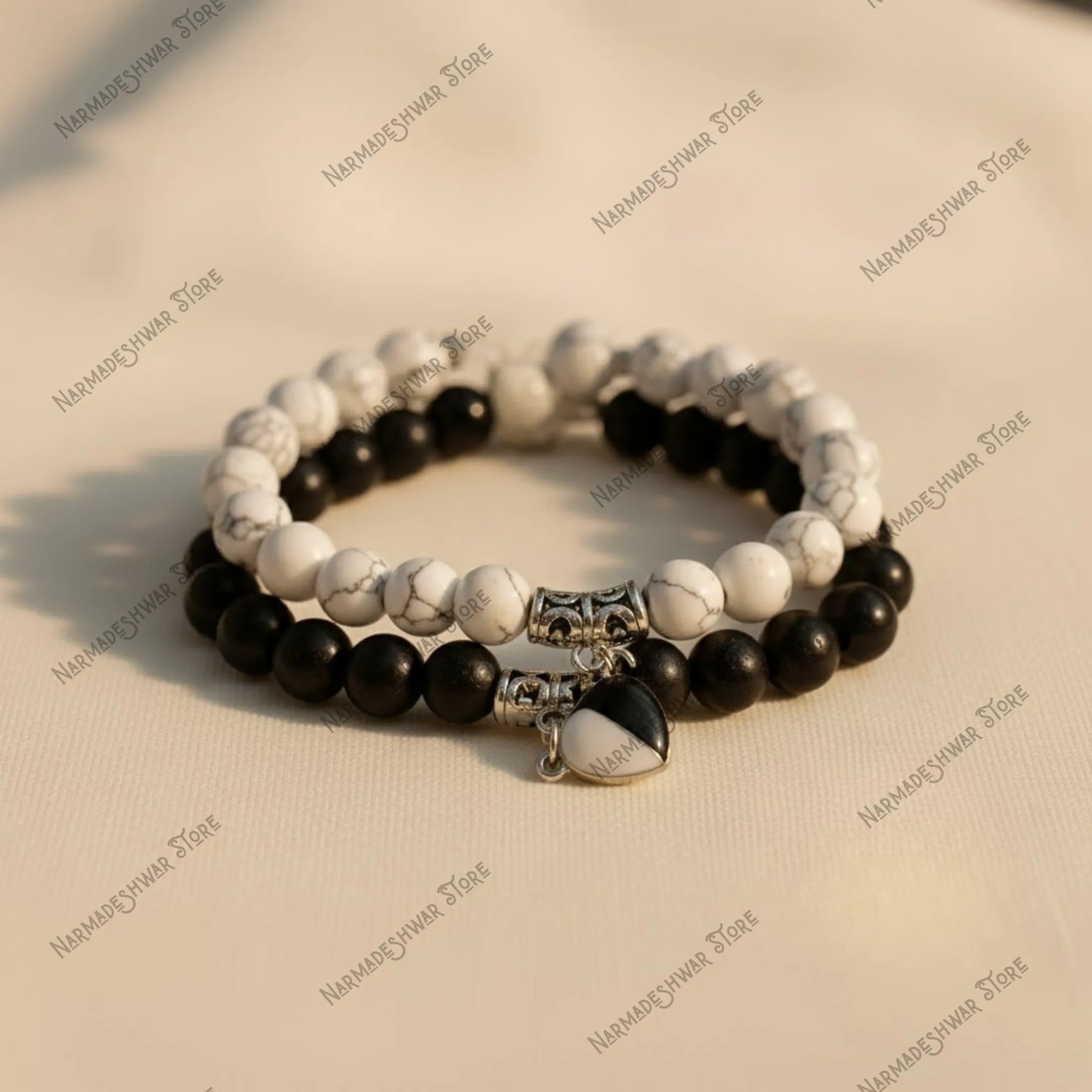 couple bracelets, couple healing bracelets, spiritual couple bracelets, couple protection bracelets, matching couple bracelets, his and her bracelets, Black Onyx couple bracelet, Howlite couple bracelet, energy healing bracelets for couples, love and bond bracelets, couple positivity bracelets, Narmadeshwar Store bracelets, abhimantrit couple bracelets, best spiritual couple bracelets in India, energized couple bracelets for love and protection, premium matching couple bracelets for gifting, couple bracelet