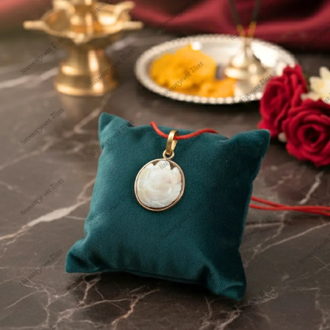 Gomti Chakra Ganesh locket for wealth luck and vastu benefits