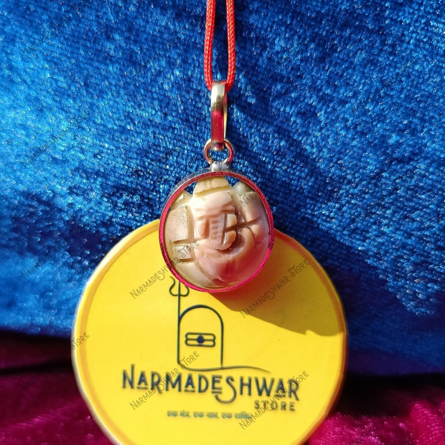 Gomati Ganesh pendant, original Gomati Ganesh necklace, Gomati Ganesh for puja, sacred Gomati Ganesh idol, Gomati stone Ganesh pendant, traditional Gomati Ganesh spiritual item, Narmadeshwar Store Gomati Ganesh, Narmadeshwar Store spiritual pendants, Narmadeshwar Store puja items, authentic products by Narmadeshwar Store, Narmadeshwar Store Vedic spiritual products, Narmadeshwar Store Hindu spiritual items