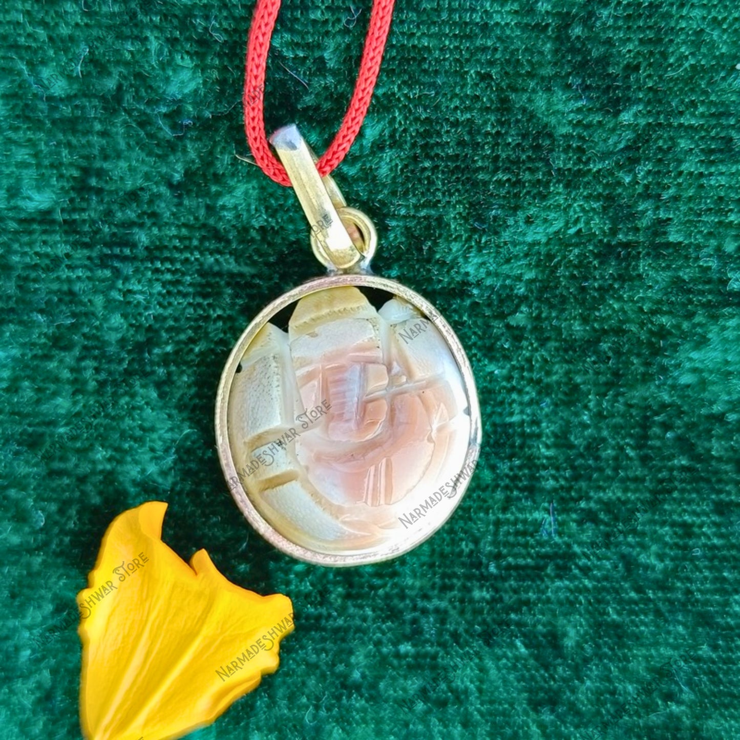 Gomati Ganesh pendant, original Gomati Ganesh necklace, Gomati Ganesh for puja, sacred Gomati Ganesh idol, Gomati stone Ganesh pendant, traditional Gomati Ganesh spiritual item, Narmadeshwar Store Gomati Ganesh, Narmadeshwar Store spiritual pendants, Narmadeshwar Store puja items, authentic products by Narmadeshwar Store, Narmadeshwar Store Vedic spiritual products, Narmadeshwar Store Hindu spiritual items