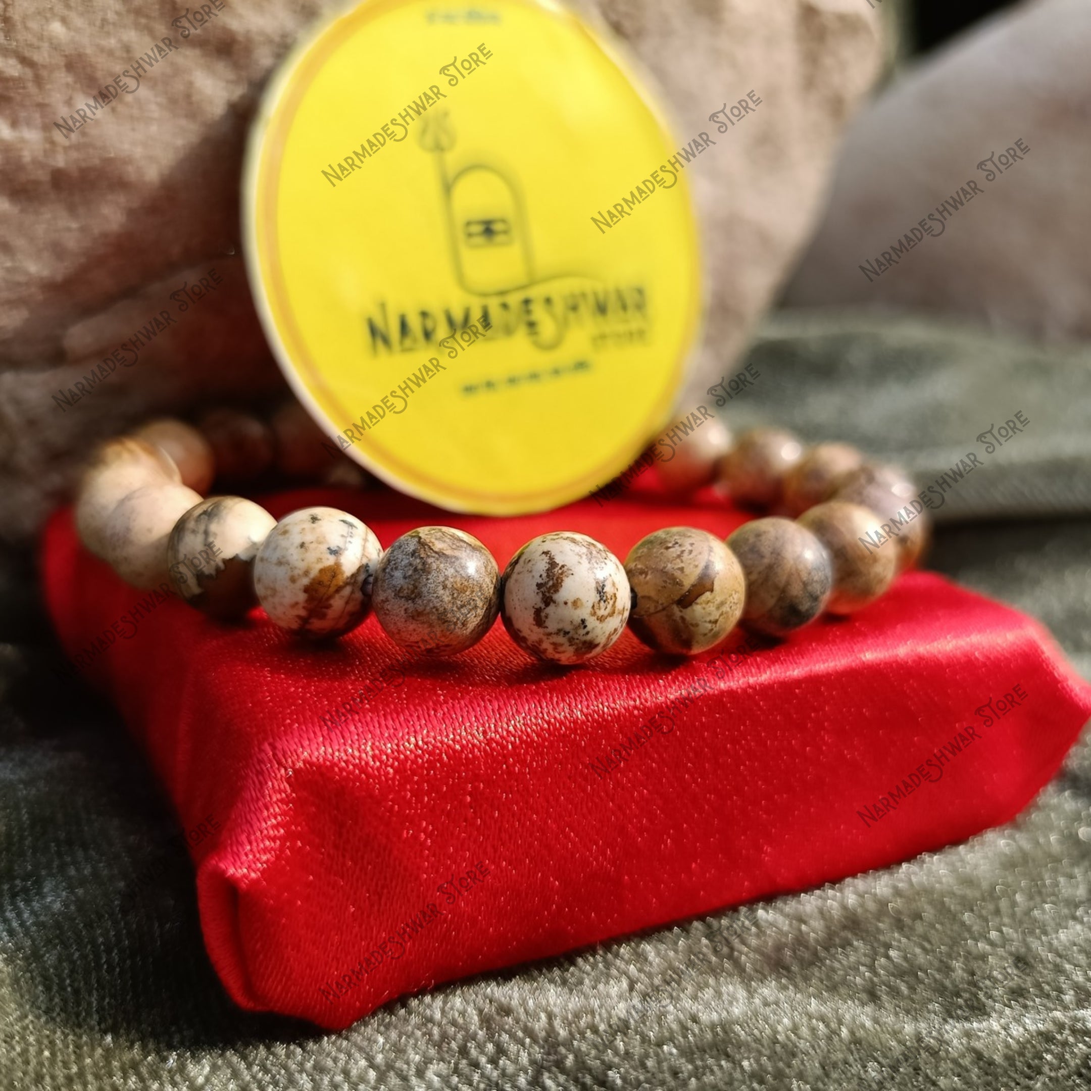 Natural Jasper Healing Bracelet on stone display