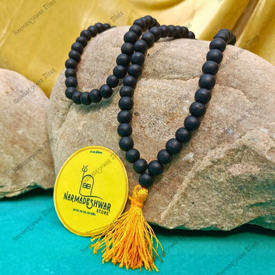 Karungali mala, original Karungali wood mala, Karungali beads mala for puja, sacred Karungali mala meditation, traditional Karungali prayer mala, handcrafted Karungali wooden mala, Narmadeshwar Store Karungali mala, Narmadeshwar Store spiritual malas, Narmadeshwar Store puja items, authentic products by Narmadeshwar Store, Narmadeshwar Store Vedic spiritual products, Narmadeshwar Store Hindu spiritual items