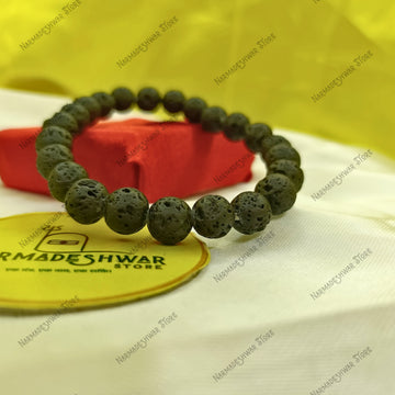 Natural Lava Stone Bracelet on red cloth for grounding and calm