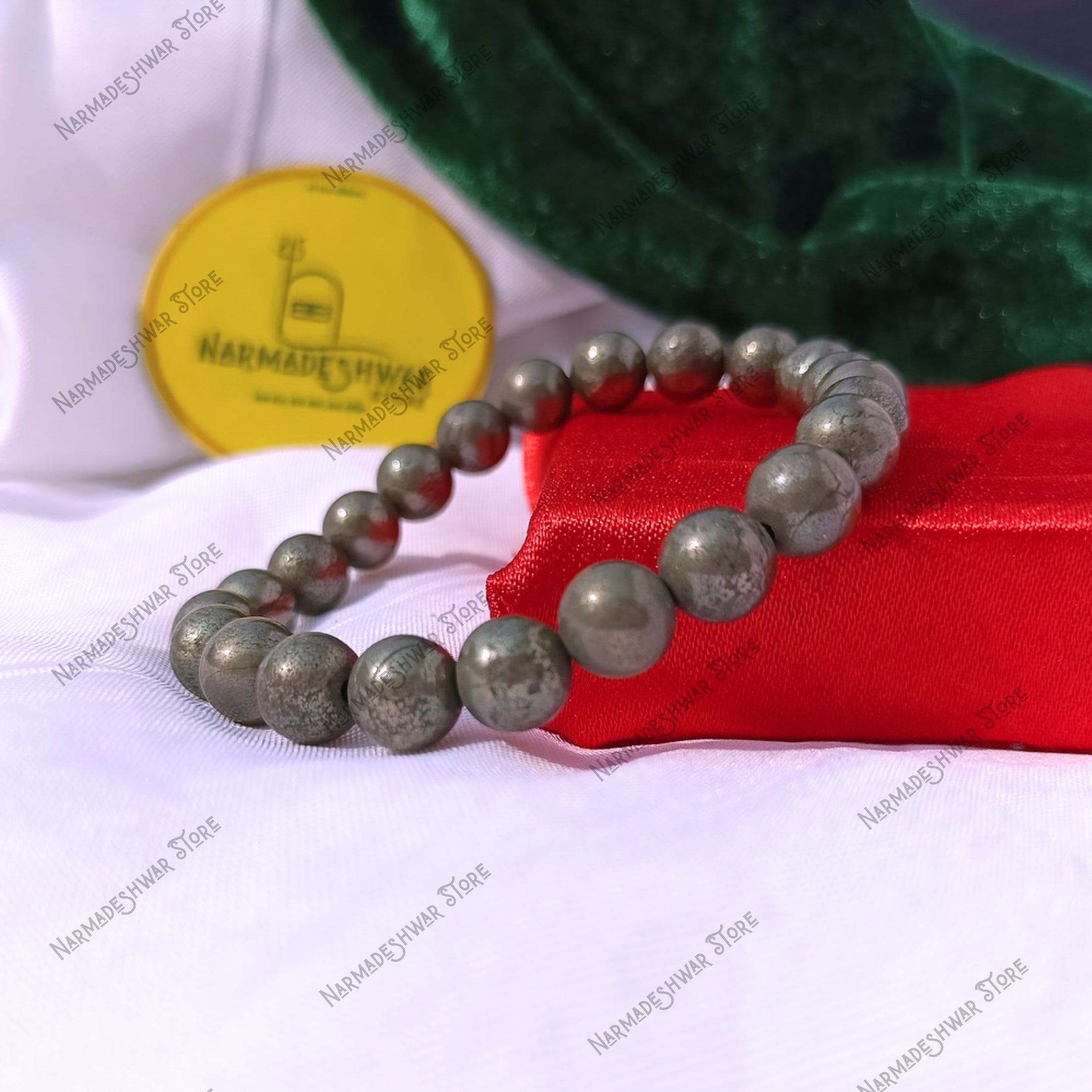Raw Pyrite wealth bracelet on white background – prosperity stone