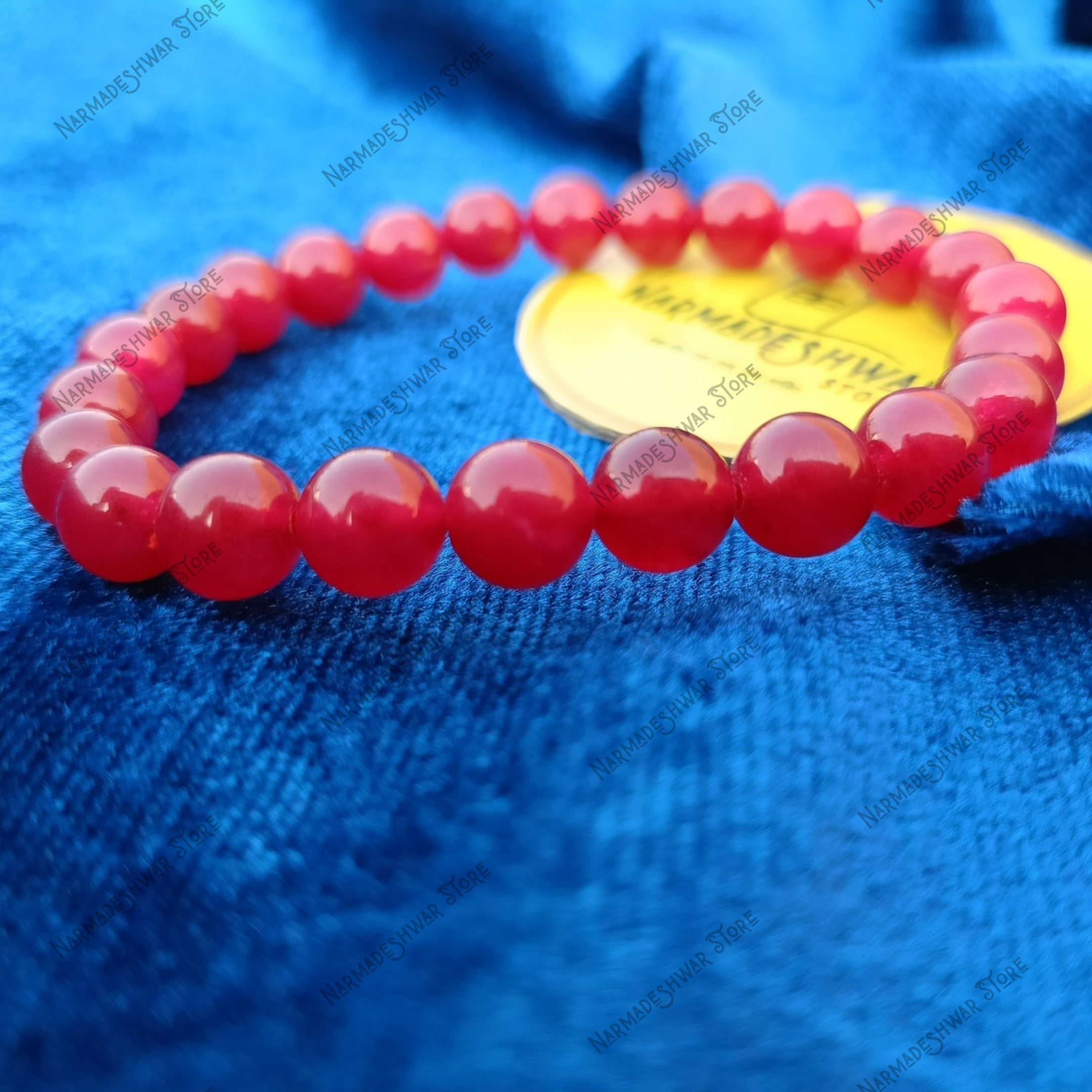 Close up of Red Agate Bracelet polished round beads