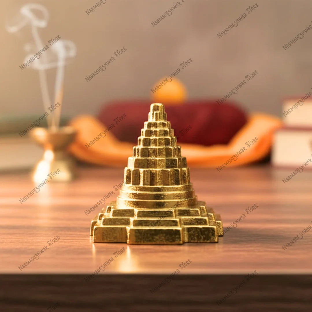 Shri Yantra for prosperity positive energy and success on a wooden surface with blurred background